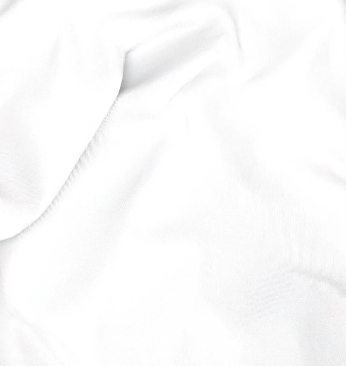 Camicia bianca: dettaglio del tessuto in piega